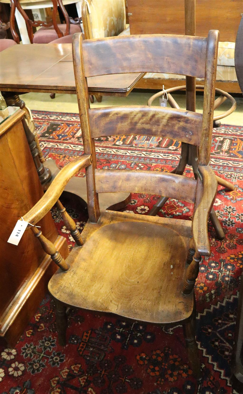 A Victorian elm and beech Windsor elbow chair